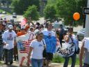 Nearly a thousand people march through Arlington to support immigration reform