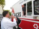 Swade-O takes an order at the DC Slices pizza truck