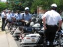 Members of the motorcade prepare to roll out
