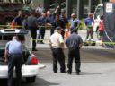 A worker fell to his death at the Arlington Court Suites Hotel in what police describe as an "industrial accident"