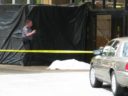 A worker fell to his death at the Arlington Court Suites Hotel in what police describe as an "industrial accident"
