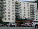 A worker fell to his death at the Arlington Court Suites Hotel in what police describe as an "industrial accident"