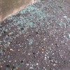 Glass from blown-out car windows on the ground after a violent storm rolled through Glass from blown-out car windows on the ground after a violent storm rolled through