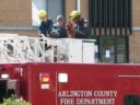 A tree trimmer is rescued by the Arlington Fire Department