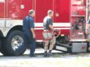 A tree trimmer is rescued by the Arlington Fire Department