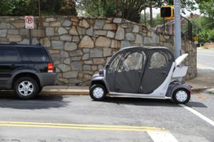 An electric vehicle was involved in an apparent rear-end collision on Columbia Pike
