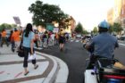 Pro-immigrant demonstrators march to a rally in Courthouse
