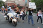 Pro-immigrant demonstrators march to a rally in Courthouse