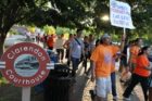 Pro-immigrant demonstrators march to a rally in Courthouse