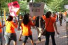 Pro-immigrant demonstrators march to a rally in Courthouse