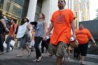 Pro-immigrant demonstrators march to a rally in Courthouse