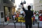 Pro-immigrant demonstrators march to a rally in Courthouse