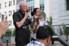 Pro-immigrant demonstrators march to a rally in Courthouse