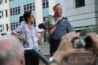 Pro-immigrant demonstrators march to a rally in Courthouse