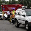 A car struck and toppled a light pole in a 7-Eleven parking lot