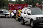 A car struck and toppled a light pole in a 7-Eleven parking lot