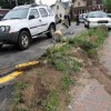 A car struck and toppled a light pole in a 7-Eleven parking lot