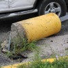 A car struck and toppled a light pole in a 7-Eleven parking lot