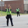 Police directing traffic at Army Navy Drive and S. Hayes Street Police directing traffic at Army Navy Drive and S. Hayes Street