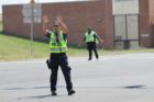 Police directing traffic at Army Navy Drive and S. Hayes Street