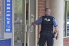 Police investigate an incident at the Ballston Capital One Bank on 7/19/11