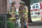 Firefighters battle an apartment fire in Ft. Myer Heights