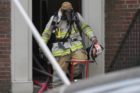 Firefighters battle an apartment fire in Ft. Myer Heights