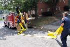Firefighters battle an apartment fire in Ft. Myer Heights