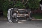 A car flipped on its roof after an accident in Ashton Heights last night (photo courtesy @dadonymous)