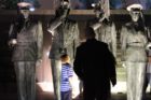 A young boy looks at statues at the Air Force Memorial