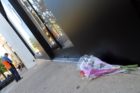 A makeshift memorial to Steve Jobs outside the Clarendon Apple Store