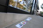 A makeshift memorial to Steve Jobs outside the Clarendon Apple Store
