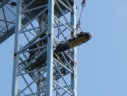 Crews bring a stretcher to the crane