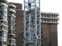 An emergency responder climbs the crane