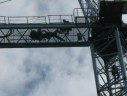 Crews assist man on crane