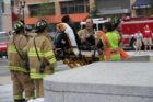 Emergency responders at the Clarendon Metro station after a person was hit by a train