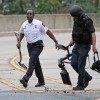 Bomb squad members and police officers investigate suspicious packages near I-66 and the Patrick Henry Drive overpass Bomb squad members and police officers investigate suspicious packages near I-66 and the Patrick Henry Drive overpass