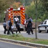 Bomb squad members and police officers investigate suspicious packages near I-66 and the Patrick Henry Drive overpass Bomb squad members and police officers investigate suspicious packages near I-66 and the Patrick Henry Drive overpass
