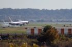 Plane landing at Reagan National Airport, as seen from the new Long Bridge Park