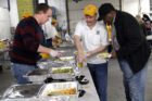 Kiwanians serving food
