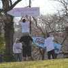 Sign spinners practicing near Columbia Pike