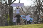 Sign spinners practicing near Columbia Pike