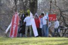 Sign spinners practicing near Columbia Pike