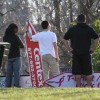Sign spinners practicing near Columbia Pike