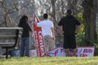 Sign spinners practicing near Columbia Pike