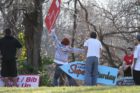 Sign spinners practicing near Columbia Pike