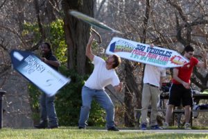 Sign spinners practicing near Columbia Pike