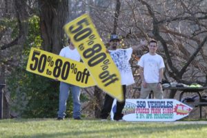 Sign spinners practicing near Columbia Pike