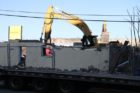 Crews tearing down the old Crystal City Motel