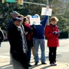 Onlookers greet veterans and President Obama